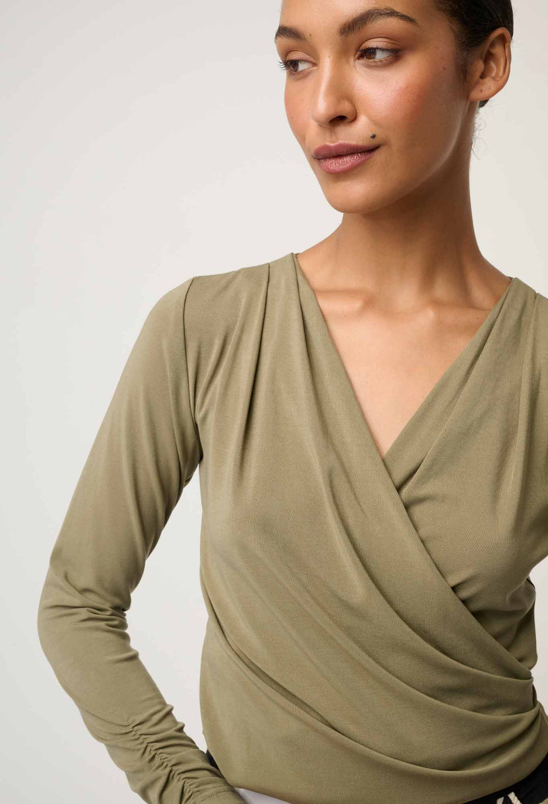 OnceWas Aster Lyocell Stretch Wrap Top in Dusty Olive